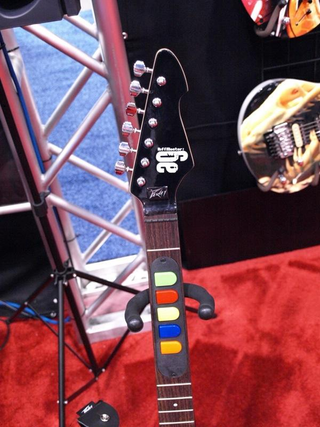 Illustration for article titled Real Peavey Riffmaster Guitar Takes Guitar Hero Rocking to the Extreme